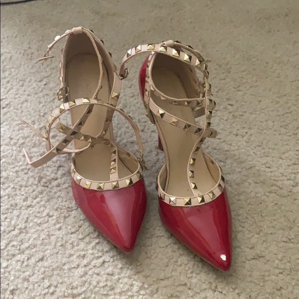 Red spike heels